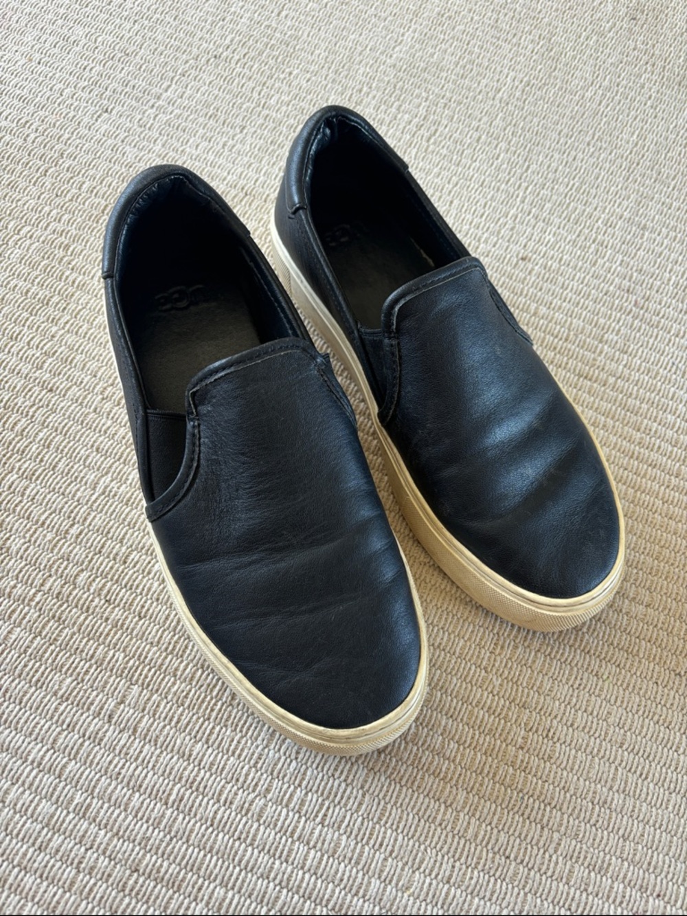 UGG Black Slip-On Leather Sneakers with Cream Sole